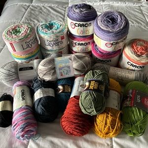 Yarn lot! 21 skeins of yarn, still in packaging.